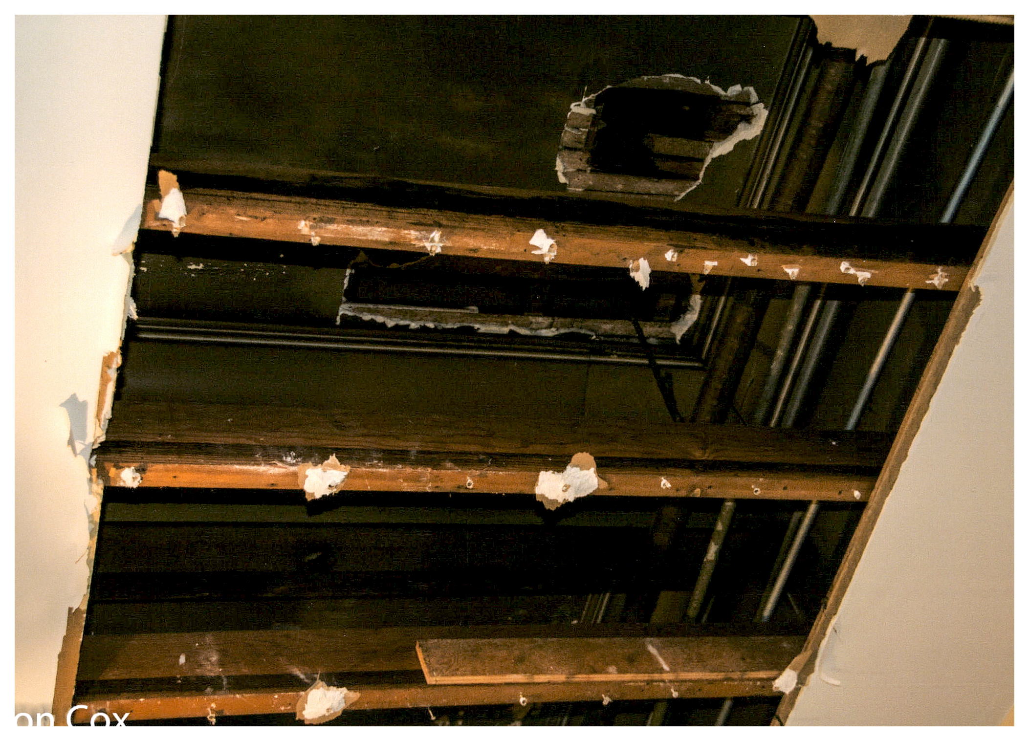 Before: close-up of the original ceiling revealing ceiling molding.